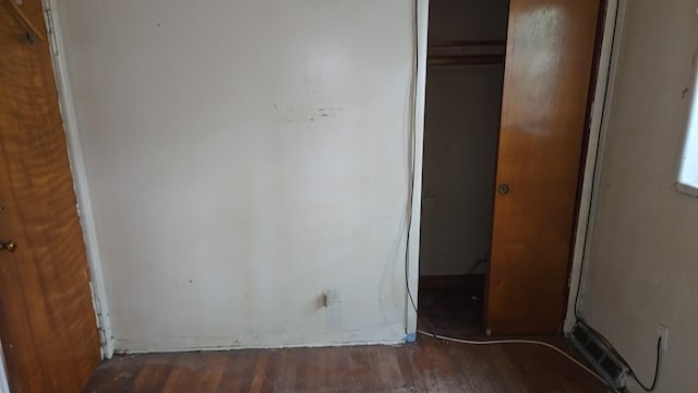 9426 S Peoria St, Chicago, IL 60620 - unfurnished bedroom with wood finished floors and a closet