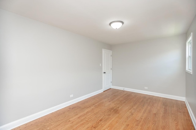 2101 W 82nd Pl, Chicago, IL 60620 - spare room with light wood finished floors and baseboards