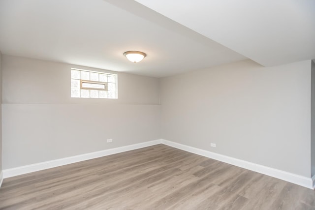 2101 W 82nd Pl, Chicago, IL 60620 - below grade area featuring light wood finished floors and baseboards