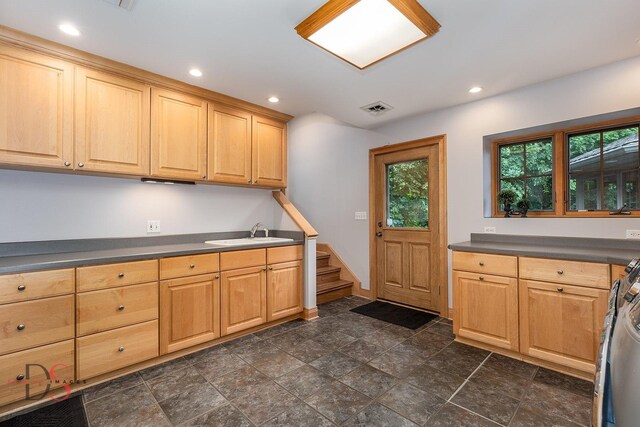 524 E Van Buren St, Ottawa, IL 61350 - kitchen with dark countertops, recessed lighting, and light brown cabinetry