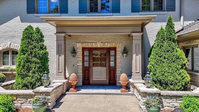 524 E Van Buren St, Ottawa, IL 61350 - doorway to property with brick siding and covered porch