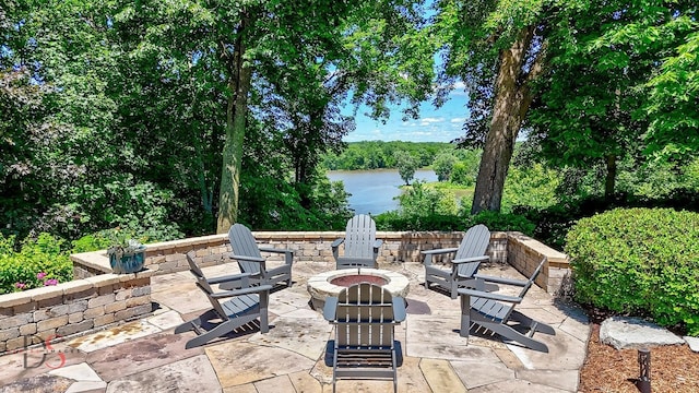 524 E Van Buren St, Ottawa, IL 61350 - view of patio / terrace with an outdoor fire pit and a water view