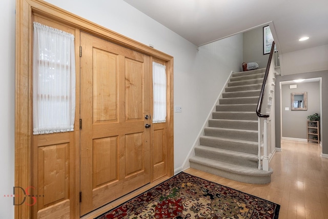 524 E Van Buren St, Ottawa, IL 61350 - foyer entrance featuring stairway, wood finished floors, and recessed lighting