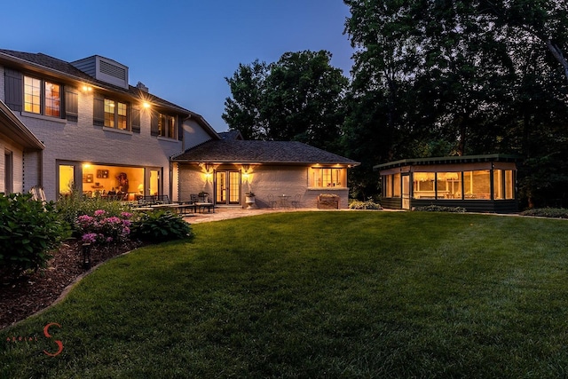 524 E Van Buren St, Ottawa, IL 61350 - rear view of property with a yard, a patio, and french doors