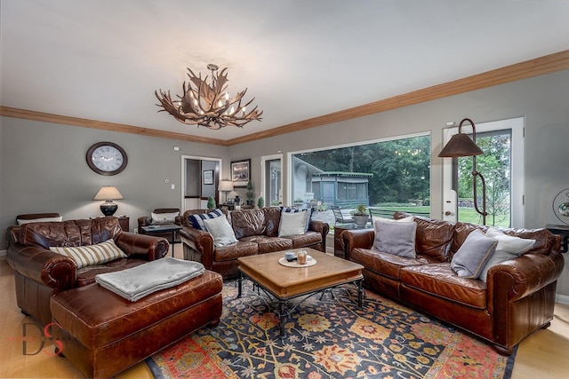 524 E Van Buren St, Ottawa, IL 61350 - living area featuring wood finished floors, a chandelier, and crown molding