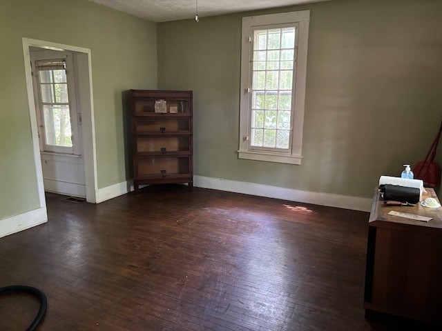 114 E Brown St, West Chicago, IL 60185 - spare room featuring wood-type flooring and healthy amount of natural light