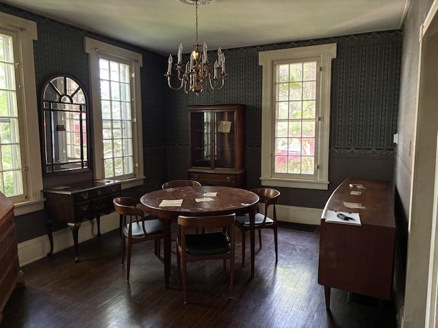 114 E Brown St, West Chicago, IL 60185 - dining area with wallpapered walls, a chandelier, and dark wood finished floors