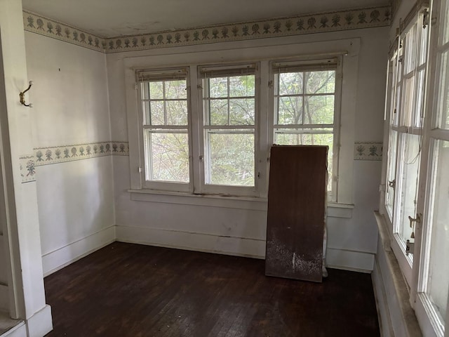 114 E Brown St, West Chicago, IL 60185 - empty room with dark wood-style flooring and healthy amount of natural light