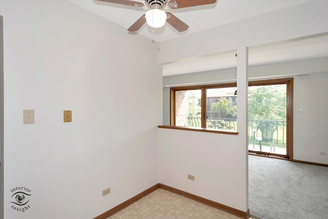 8838 W 140th St Unit 2D, Orland Park, IL 60462 - spare room featuring baseboards and a ceiling fan