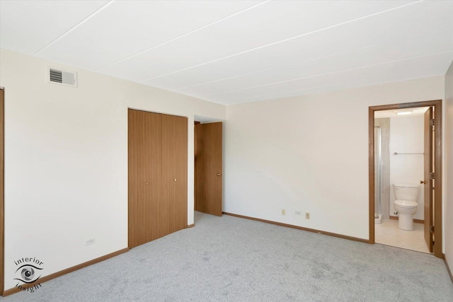 8838 W 140th St Unit 2D, Orland Park, IL 60462 - unfurnished bedroom featuring light colored carpet, a closet, and ensuite bath