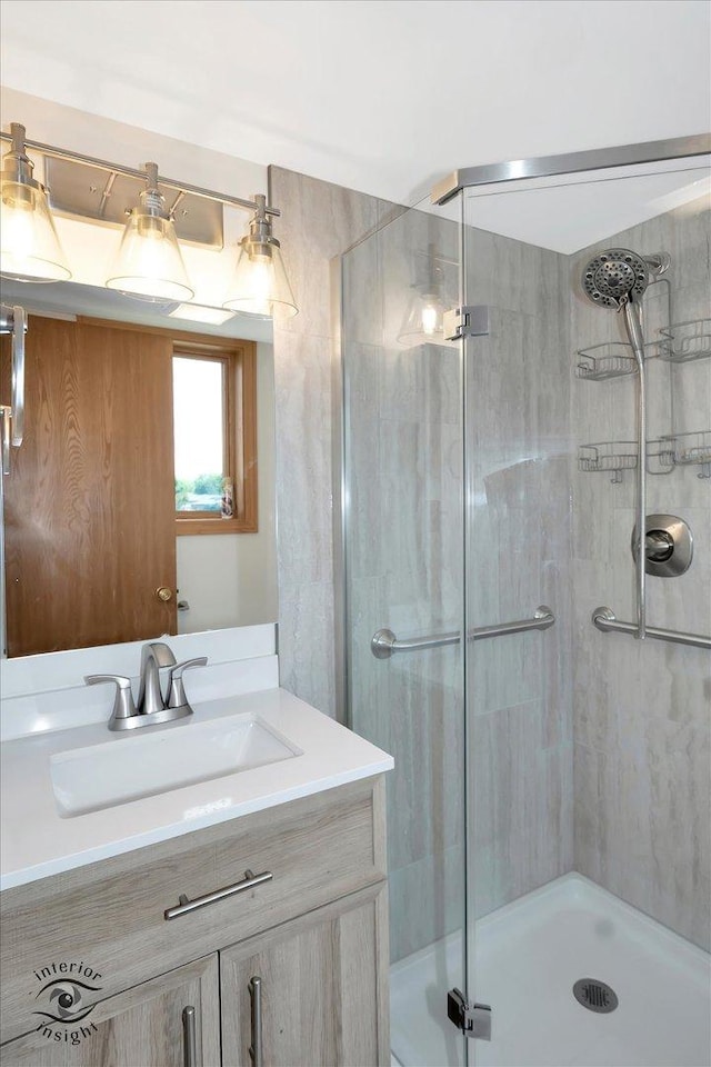 8838 W 140th St Unit 2D, Orland Park, IL 60462 - bathroom featuring vanity and a shower stall