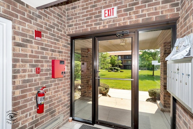 8838 W 140th St Unit 2D, Orland Park, IL 60462 - doorway featuring brick wall and tile patterned flooring
