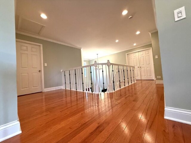 1860 Dorchester Ave, Algonquin, IL 60102 - empty room featuring hardwood / wood-style floors, ornamental molding, attic access, and recessed lighting