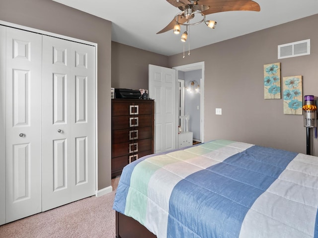 1597 Plum Tree Ln, Aurora, IL 60504 - bedroom with light colored carpet, ceiling fan, and a closet
