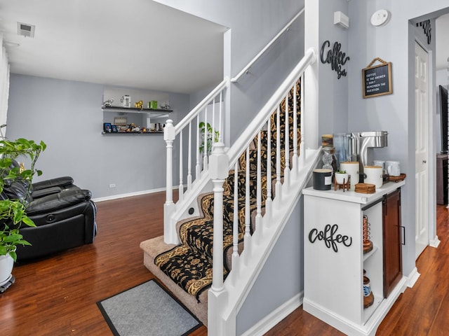 1597 Plum Tree Ln, Aurora, IL 60504 - stairway with wood finished floors and baseboards