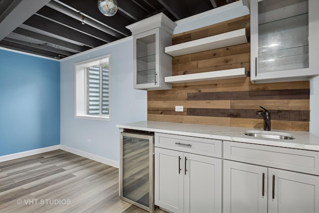 1434 Somerset Pl, Barrington, IL 60010 - bar featuring wine cooler, light wood-style flooring, and wood walls