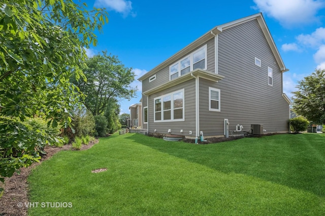 1434 Somerset Pl, Barrington, IL 60010 - view of property exterior featuring a lawn and a central AC unit