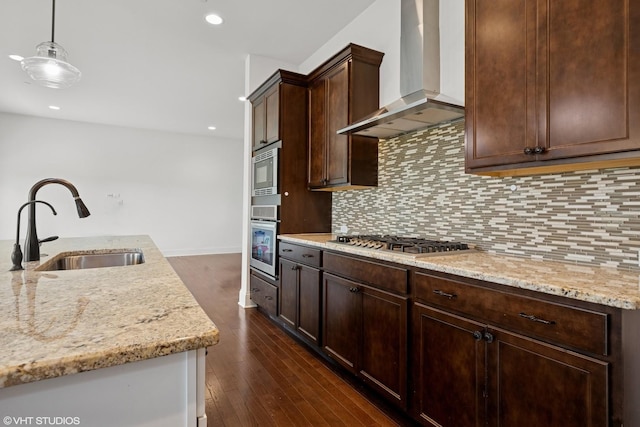 1434 Somerset Pl, Barrington, IL 60010 - kitchen featuring wall chimney range hood, stainless steel appliances, backsplash, light stone countertops, and dark brown cabinets