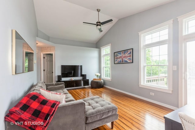 1190 Harbor Ct Unit 1190, Glendale Heights, IL 60139 - living area featuring healthy amount of natural light, a ceiling fan, wood finished floors, and high vaulted ceiling