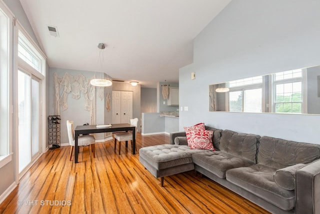 1190 Harbor Ct Unit 1190, Glendale Heights, IL 60139 - living area featuring light wood-style flooring and baseboards