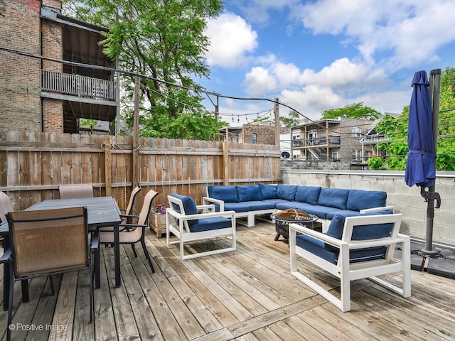 1310 N Western Ave Unit 2N, Chicago, IL 60622 - deck with an outdoor living space with a fire pit and outdoor dining area