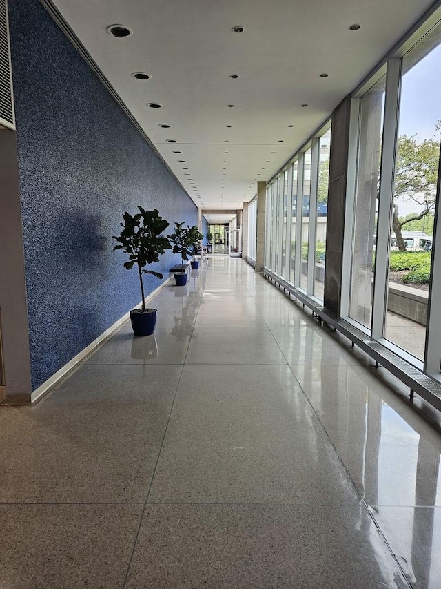 4800 S Chicago Beach Dr Unit 910N, Chicago, IL 60615 - hall with expansive windows and speckled floor