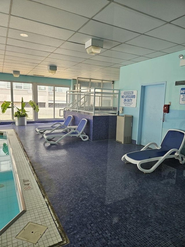 4800 S Chicago Beach Dr Unit 910N, Chicago, IL 60615 - exercise room with a paneled ceiling