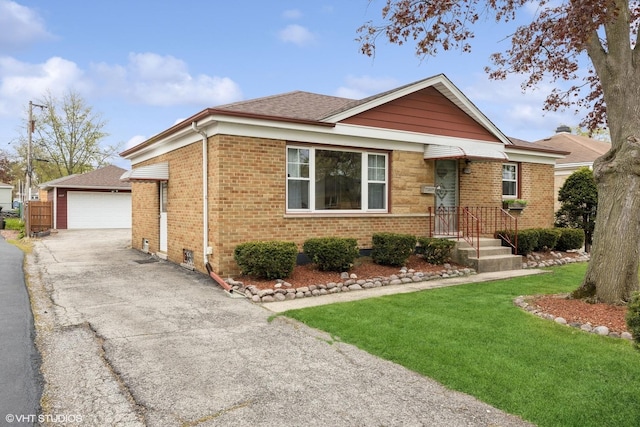 1609 Boeger Ave, Westchester, IL 60154 - view of front of property featuring brick siding, a detached garage, an outbuilding, a front yard, and a shingled roof