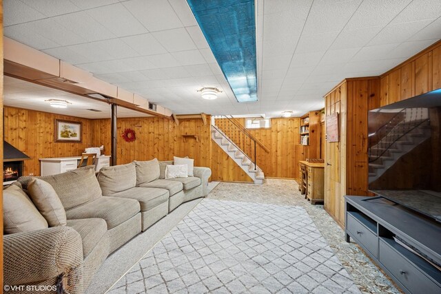 1609 Boeger Ave, Westchester, IL 60154 - living room with stairs, light carpet, and wood walls