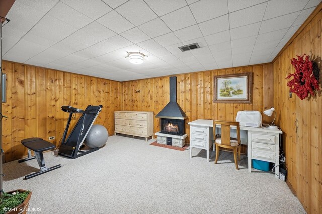1609 Boeger Ave, Westchester, IL 60154 - office area with carpet floors, a wood stove, and wood walls