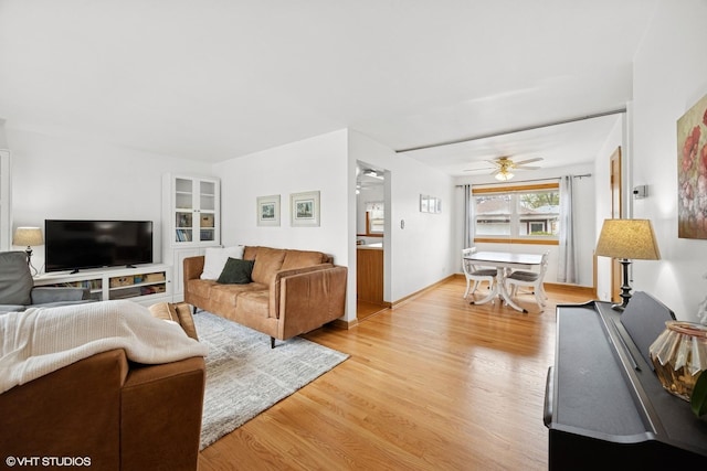 1609 Boeger Ave, Westchester, IL 60154 - living area with ceiling fan and light wood-style flooring