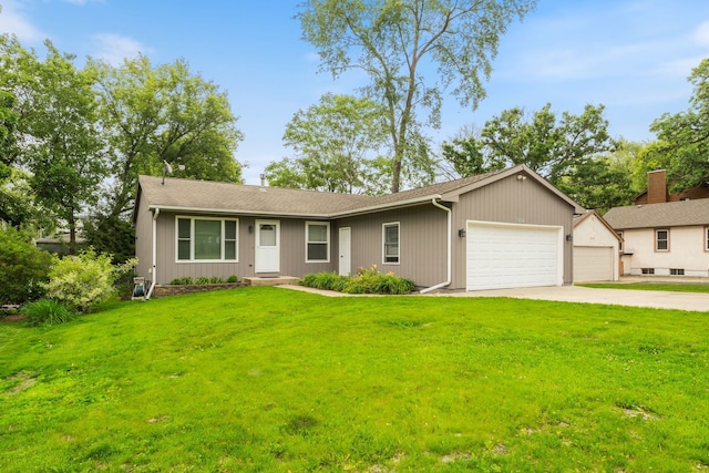 3112 Cedar Ter, Island Lake, IL 60042 - view of front of house featuring a garage, a front lawn, and concrete driveway
