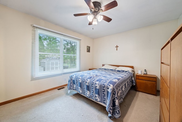 3112 Cedar Ter, Island Lake, IL 60042 - bedroom with light colored carpet and ceiling fan