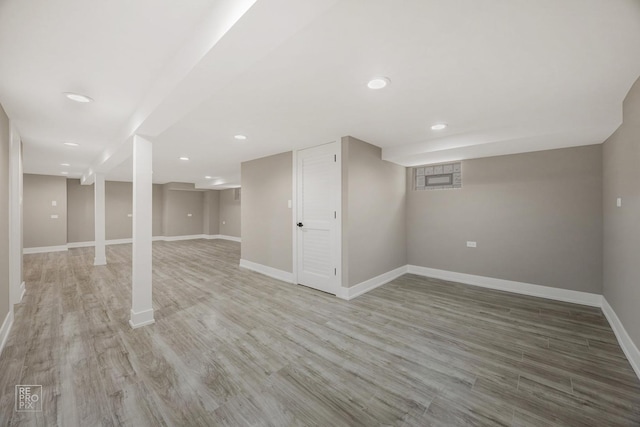 3800 W 82nd St, Chicago, IL 60652 - finished below grade area with light wood-type flooring and recessed lighting