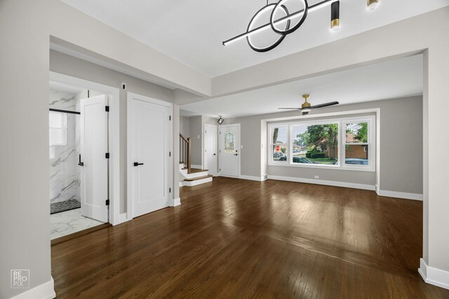 3800 W 82nd St, Chicago, IL 60652 - unfurnished living room featuring stairs, wood finished floors, and ceiling fan
