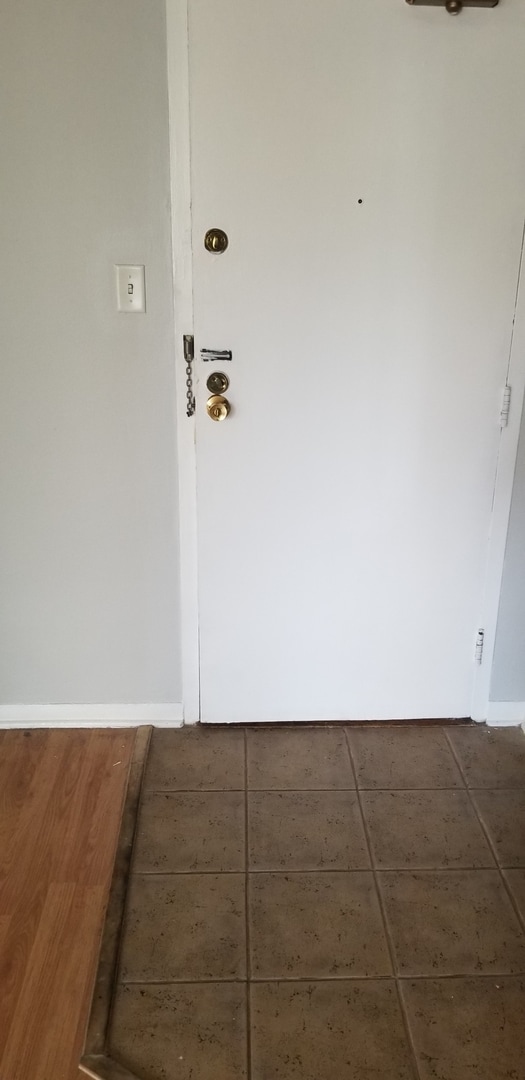 6300 N Sheridan Rd Unit 107, Chicago, IL 60660 - empty room with baseboards
