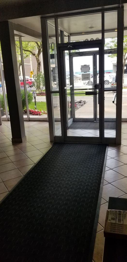 6300 N Sheridan Rd Unit 107, Chicago, IL 60660 - doorway to outside featuring tile patterned flooring