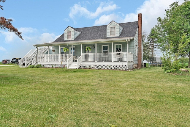 31330 S Seltzer Rd, Wilmington, IL 60481 - view of front of home with a front yard, covered porch, a chimney, and roof with shingles