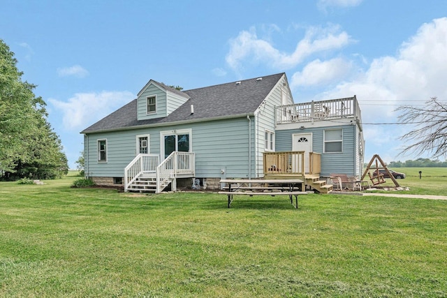 31330 S Seltzer Rd, Wilmington, IL 60481 - rear view of house with a yard, roof with shingles, a balcony, and a wooden deck