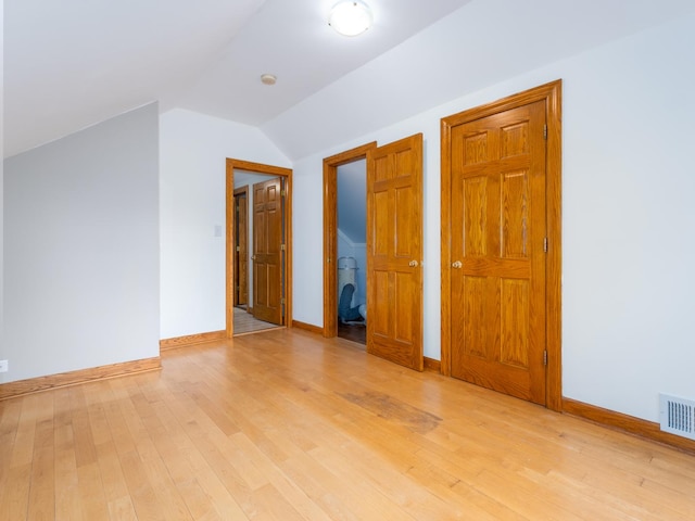2435 Davisson St, River Grove, IL 60171 - additional living space with vaulted ceiling and light wood-type flooring