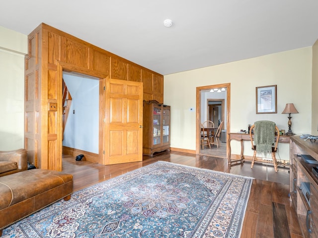 2435 Davisson St, River Grove, IL 60171 - living room featuring dark wood-style flooring and baseboards