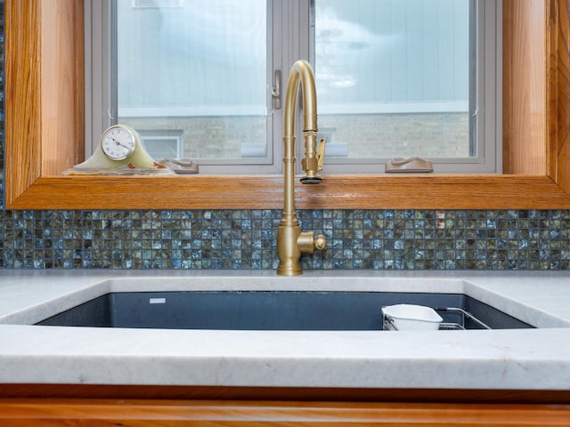 2435 Davisson St, River Grove, IL 60171 - kitchen view of a sink and decorative backsplash
