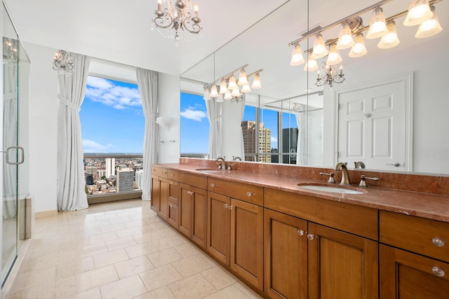 21 E Huron St Unit 4701, Chicago, IL 60611 - full bath featuring a chandelier, double vanity, tile patterned flooring, a view of city, and a shower stall
