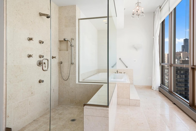 21 E Huron St Unit 4701, Chicago, IL 60611 - bathroom featuring tiled shower, a bath, a chandelier, baseboard heating, and tile patterned floors
