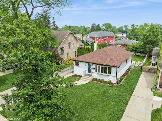 127 Elm St, Glenview, IL 60025 - view of front facade featuring a shingled roof, a residential view, and stucco siding
