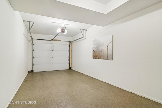 884 Bristol Dr Unit 0, Barrington, IL 60010 - garage featuring a garage door opener and baseboards