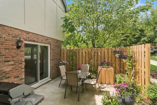 884 Bristol Dr Unit 0, Barrington, IL 60010 - view of patio / terrace featuring outdoor dining space and area for grilling