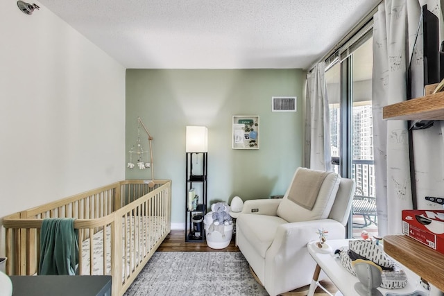 400 N La Salle Dr Unit 1607, Chicago, IL 60654 - bedroom with wood finished floors and a textured ceiling