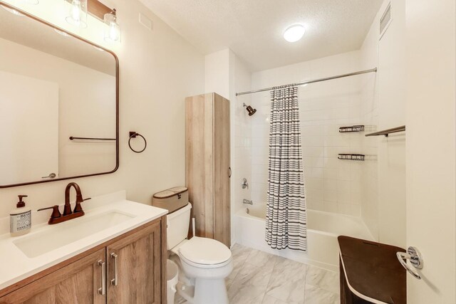 400 N La Salle Dr Unit 1607, Chicago, IL 60654 - bathroom featuring shower / tub combo, vanity, and marble finish flooring