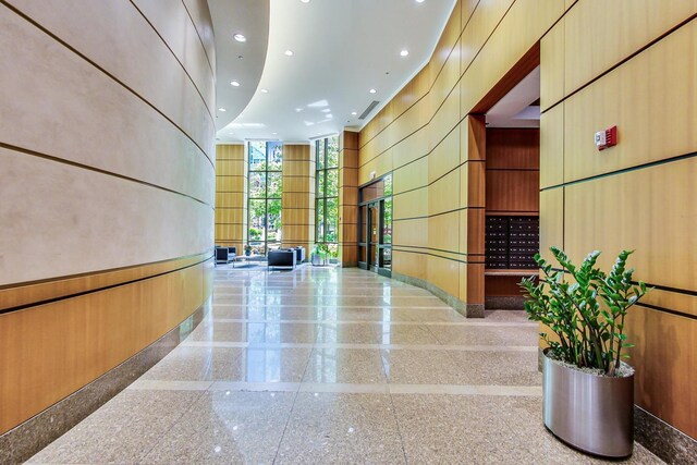 400 N La Salle Dr Unit 1607, Chicago, IL 60654 - lobby with recessed lighting, expansive windows, and a towering ceiling